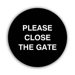 PLEASE CLOSE THE GATE black waymarker sign