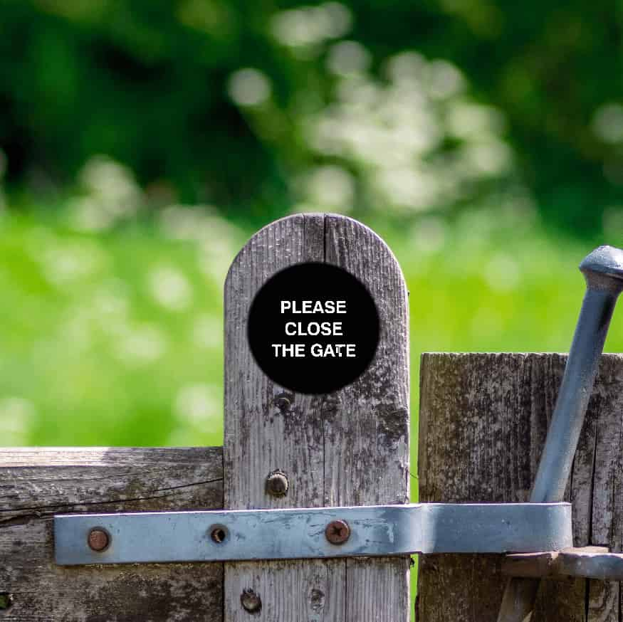 PLEASE CLOSE THE GATE black waymarker sign